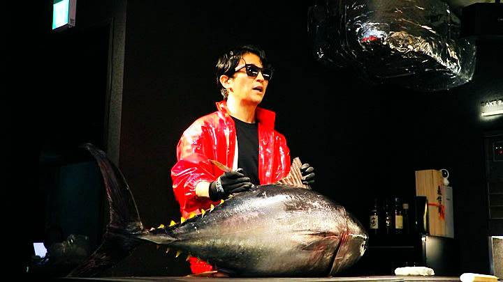 A whole bluefin tuna presented to the room