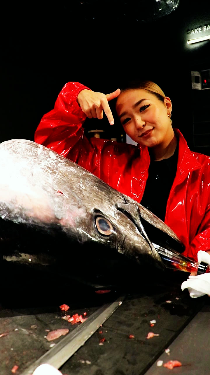 A member of the team with the tuna head used for the tuna shot